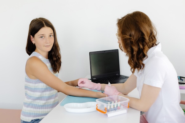 Child-friendly blood test being performed